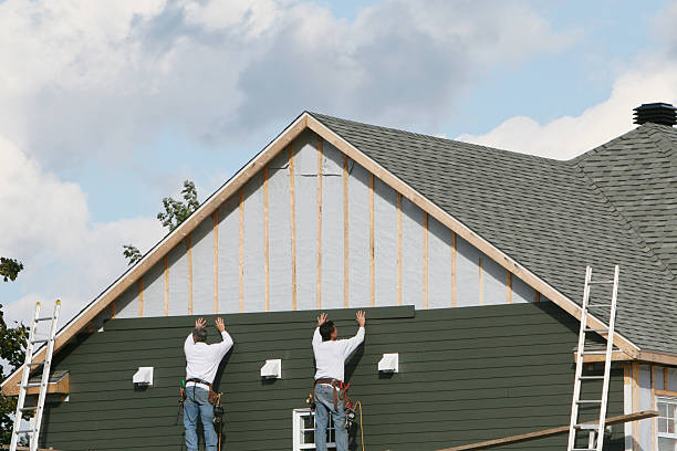 Professional Emergency Siding Repair technician working in Monroe, NC